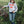 Load image into Gallery viewer, Person wearing a hoodie with 'Wisco' design in a rural setting