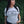 Load image into Gallery viewer, Woman wearing a 'Wisconsin Up' t-shirt against a green ivy background