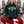 Load image into Gallery viewer, Person wearing a green &#39;Wisconsin Up&#39; hoodie in front of Christmas trees.
