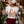 Load image into Gallery viewer, Woman in festive outfit with &#39;Santa&#39;s Favorite Local&#39; shirt at a Christmas market.
