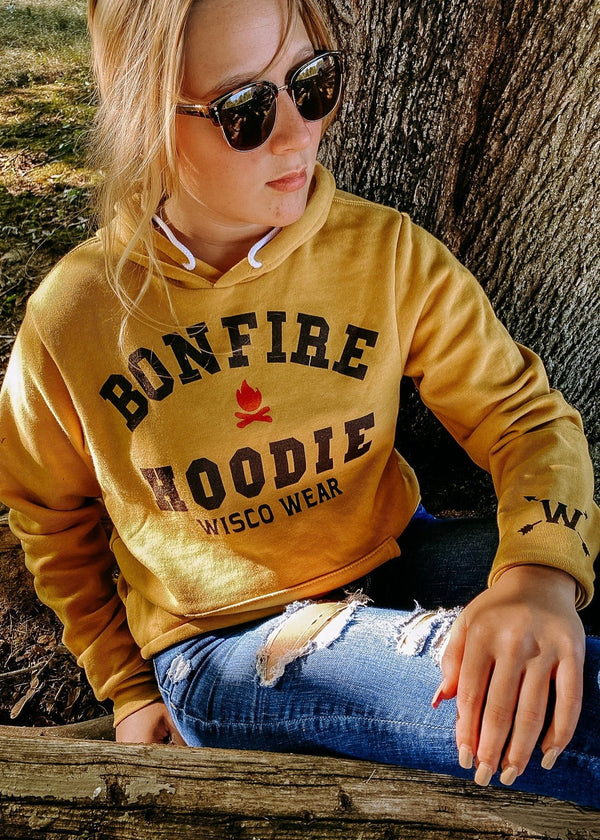 Cozy "Bonfire Hoodie" perfect for cool evenings around the fire. On female.