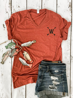 "More Lakes Than Minnesota" t-shirt showcasing Wisconsin pride for lake lovers. Front view of shirt.