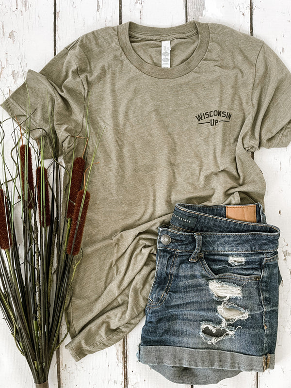"Northwoods of Wisco" t-shirt celebrating the outdoor lifestyle and natural beauty of Wisconsin's Northwoods. Front view of shirt with logo.