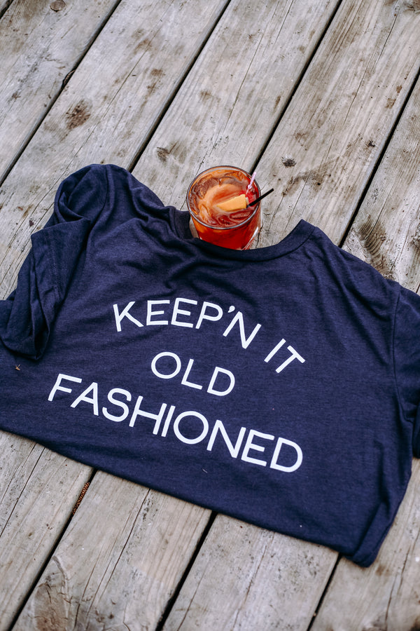 "Keepin' It Old Fashioned" t-shirt celebrating classic cocktails, perfect for laid-back occasions.