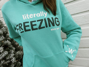 "Literally Freezing" hoodie for cold weather enthusiasts, perfect for staying warm in winter. Beautiful blue and teal tones.