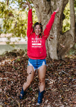 Cozy "Bloody Marys Are Breakfast" hoodie, perfect for brunch lovers. Showcased outside.